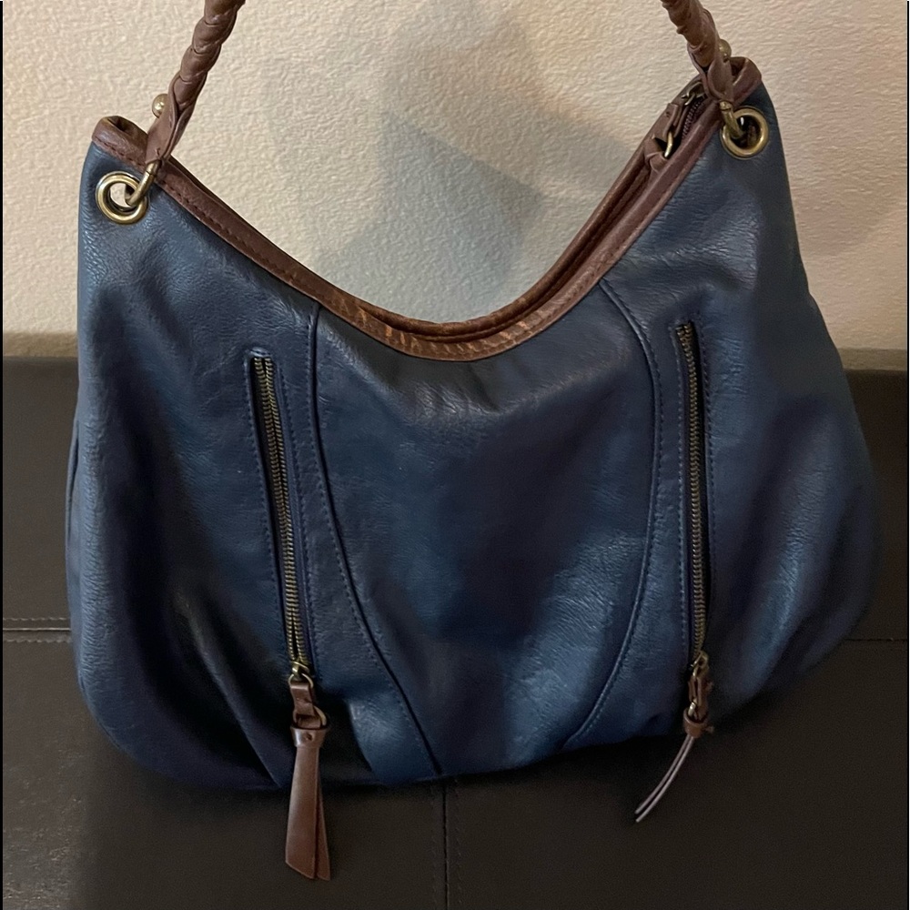 Blue and brown accents, braided shoulder straps soft leather